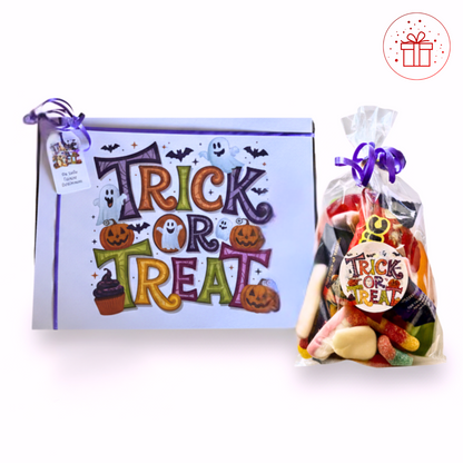 Halloween-themed gift set with a box and bag of candy on a white background
